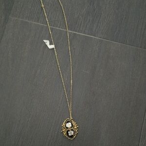Elegant Gold and Black Pendant Necklace